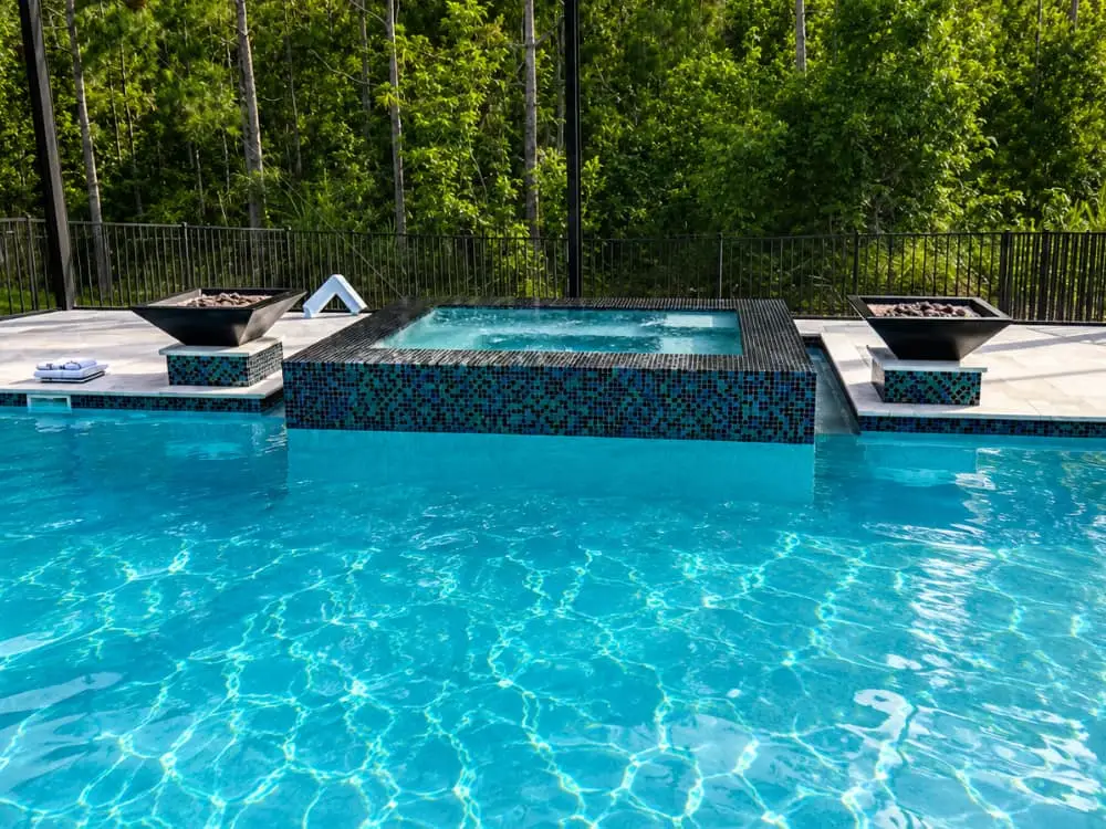 gallery pool, raised spa, fire fountains by Agua Pools Florida