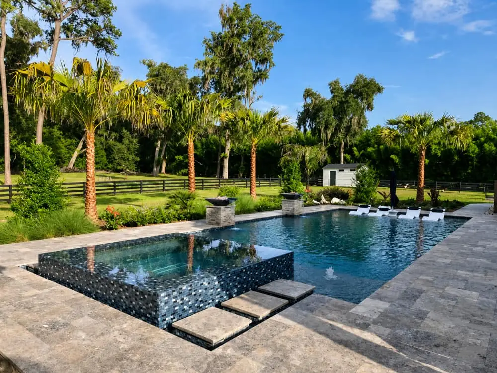 pool, spa, decking, around landscape by Ocala Pool Builder Agua Pools